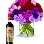 Rose e fiori fuxia con amaro Lucano a Roma